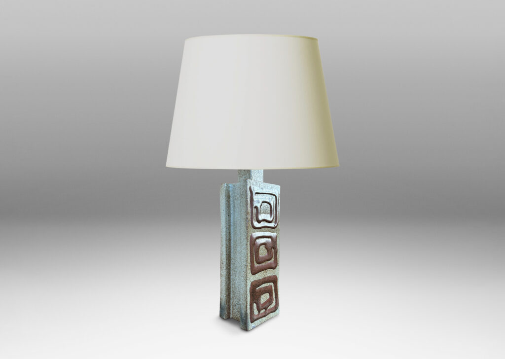 Gallery BAC two floating rectangular planes connected by a central pillar, glazed in dappled gray-brown with concentric square motifs in red luster