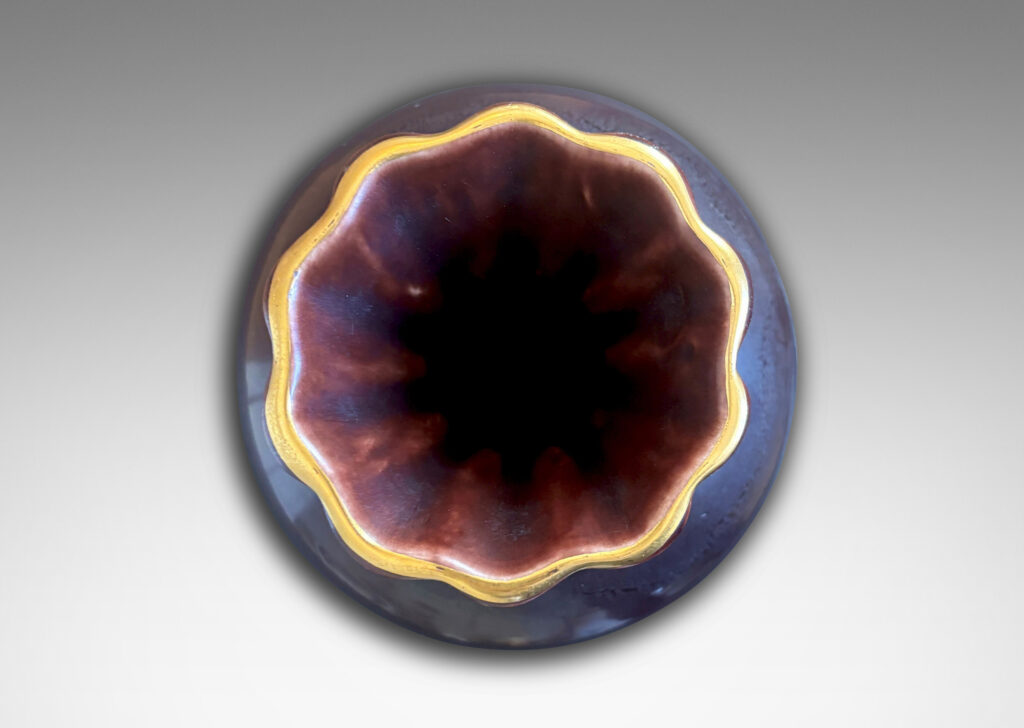 Gallery BAC globe form with issuing frilled trumpet mouth, glazed in a deep ganache brown with gilded outline to lip