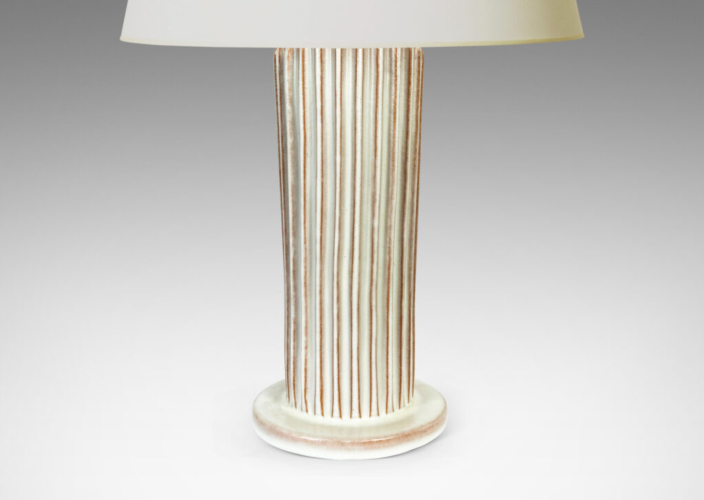 Gallery BAC tapered fluted forms on disks in a white glaze