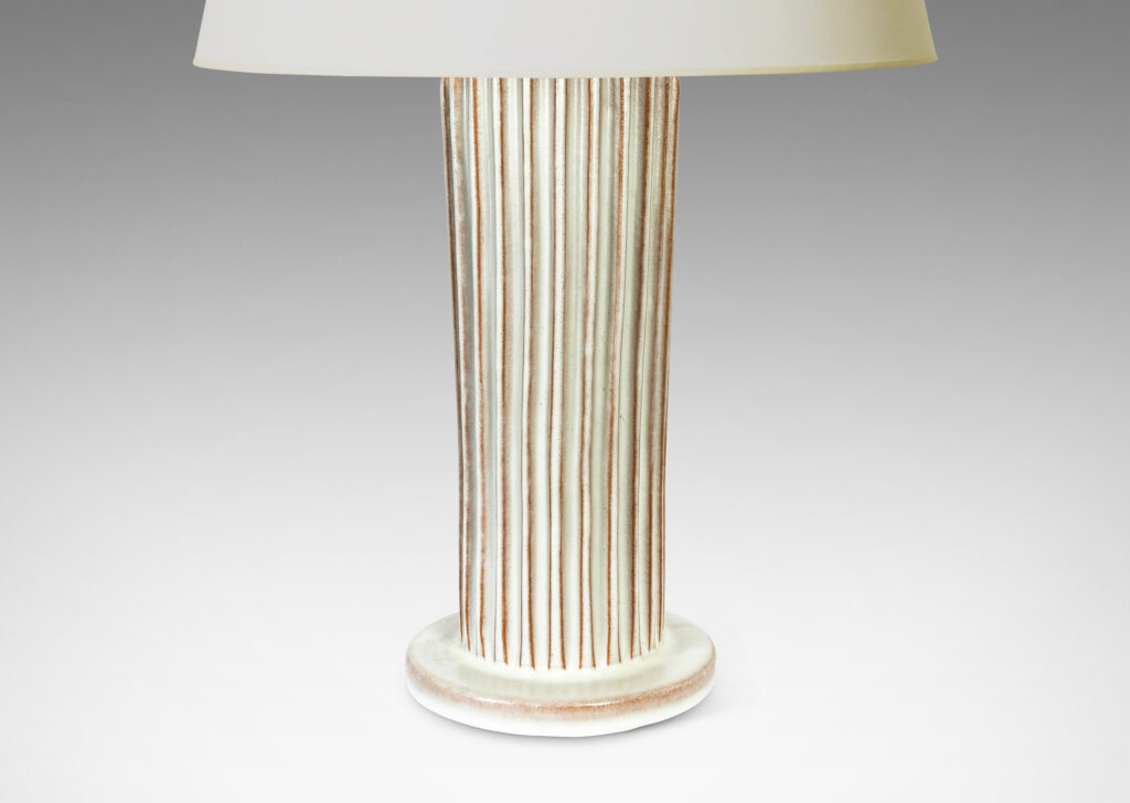 Gallery BAC tapered fluted forms on disks in a white glaze