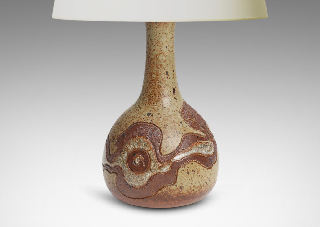 Gallery BAC plump globe form with tall attenuated neck, encircled in a textured relief of organic form, glazed in brown and gauzy white against brown spotted pale gray