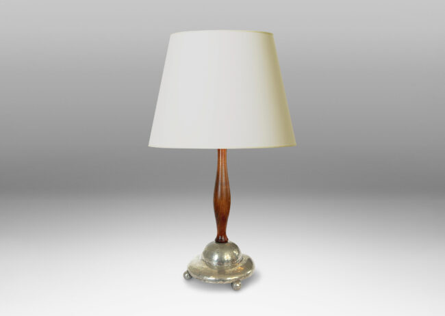 Gallery BAC pillowy tiered base with hammered finish and ball feet, and sculpted stand; pewter and wood