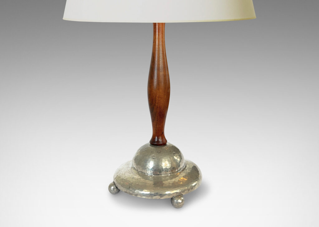 Gallery BAC pillowy tiered base with hammered finish and ball feet, and sculpted stand; pewter and wood