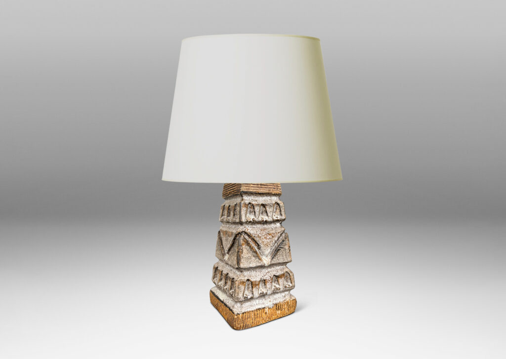 Gallery BAC square tapered obelisk-like forms with carved patterns of triangle motifs, glazed in running pale gray and matte brown