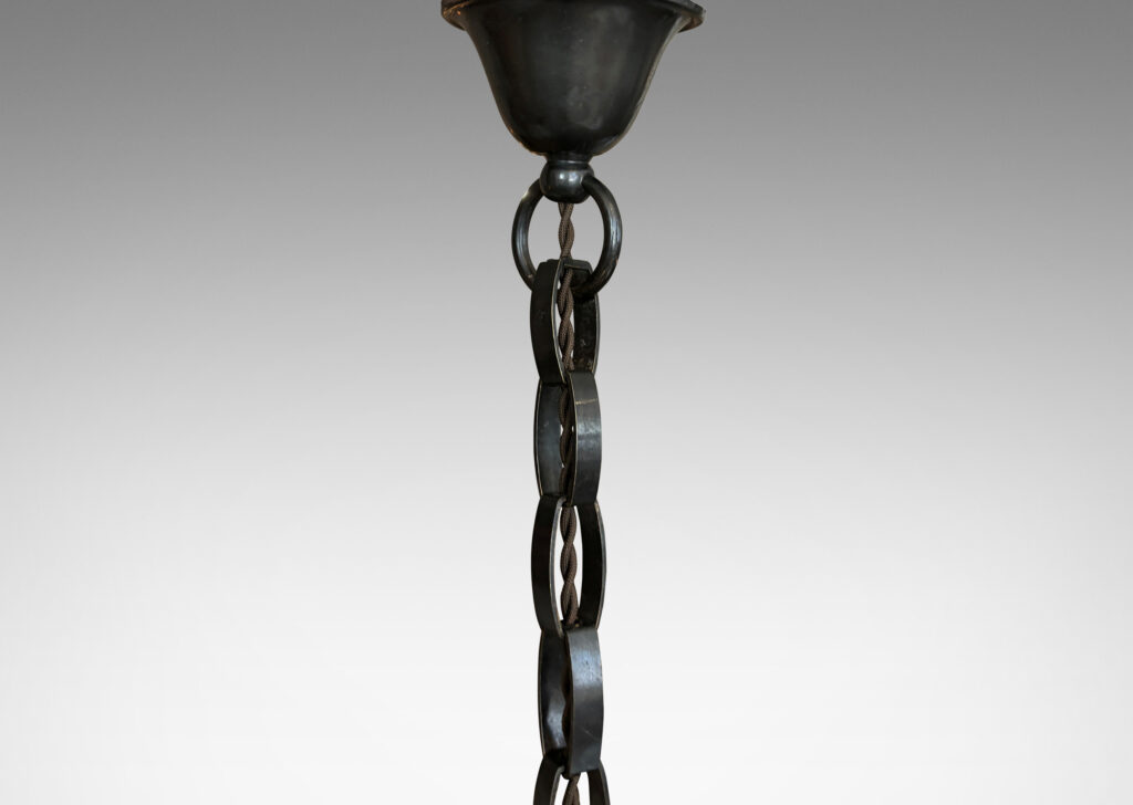Gallery BAC cylindrical form with stepped top, slender turned brackets and hand-crafted chain patinated in a dark bronze tone