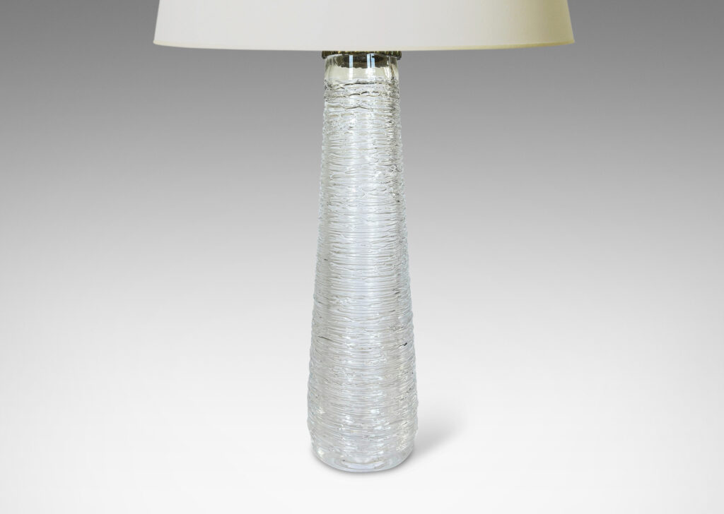 Gallery BAC tall tapered forms finished in an organic thin striae texture; crystal
