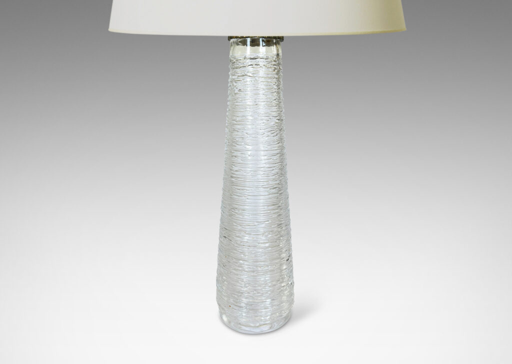Gallery BAC tall tapered forms finished in an organic thin striae texture; crystal