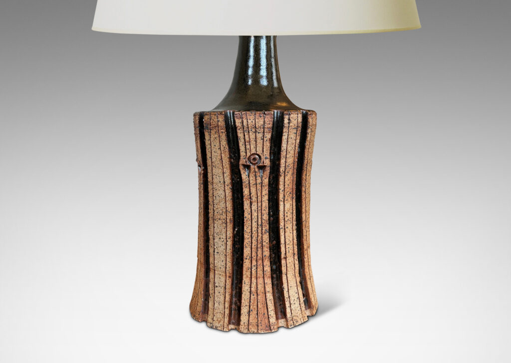 Gallery BAC unglazed cylindrical form with deeply carved ribs, with chocolate brown glazed top and stripes