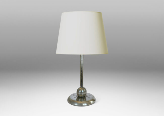 Gallery BAC stand on a ball and disk plinth, playfully engraved with stars, suns and moons