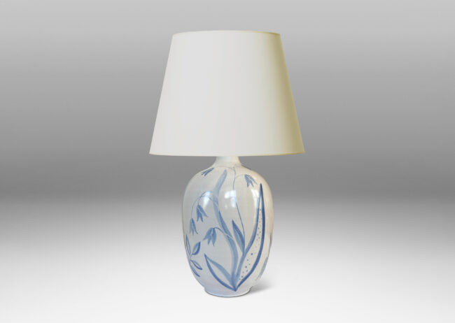 Gallery BAC ovoid form glazed in white with folk-style floral designs in light blue tones