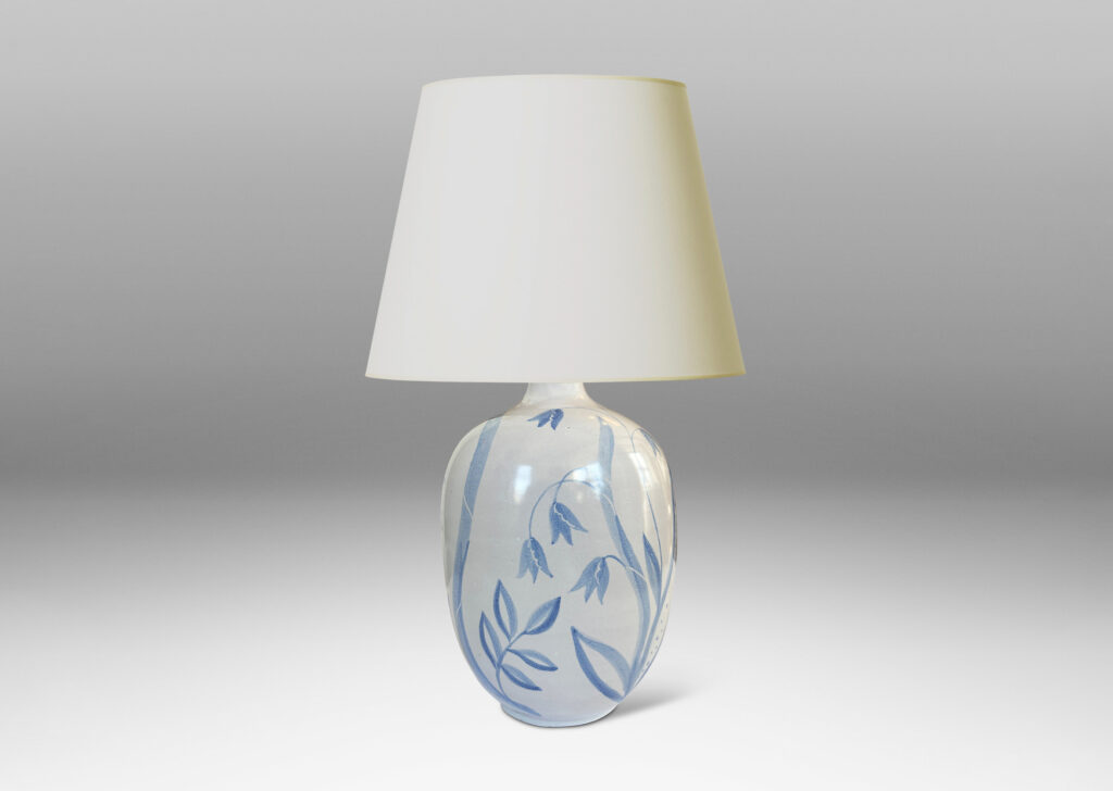 Gallery BAC ovoid form glazed in white with folk-style floral designs in light blue tones