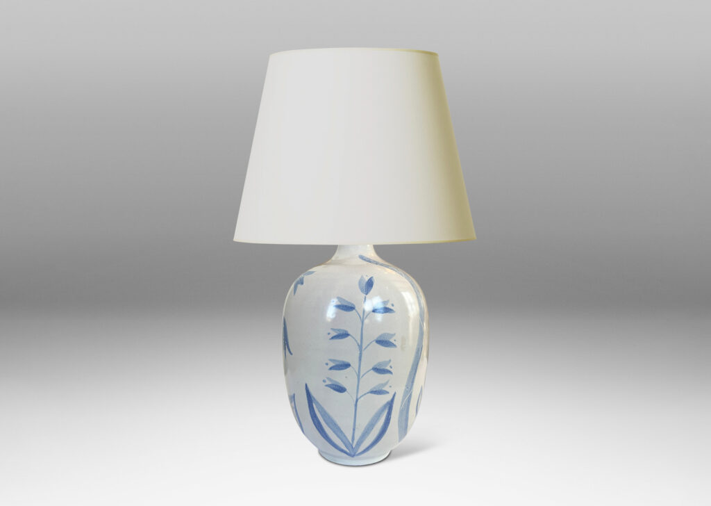 Gallery BAC ovoid form glazed in white with folk-style floral designs in light blue tones