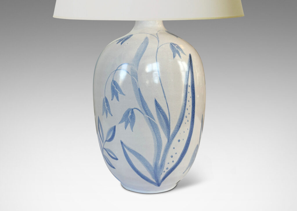 Gallery BAC ovoid form glazed in white with folk-style floral designs in light blue tones