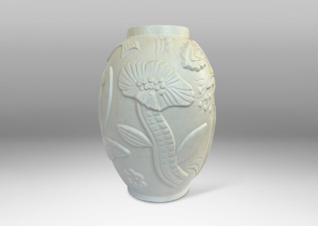Gallery BAC void form with reliefs depicting marine flora and fauna in an eggshell finish warm ivory glaze
