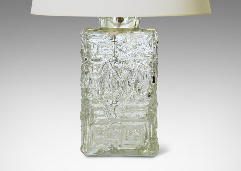 Gallery BAC square canister forms with various geometric designs in reliefs; clear mold-blown glass