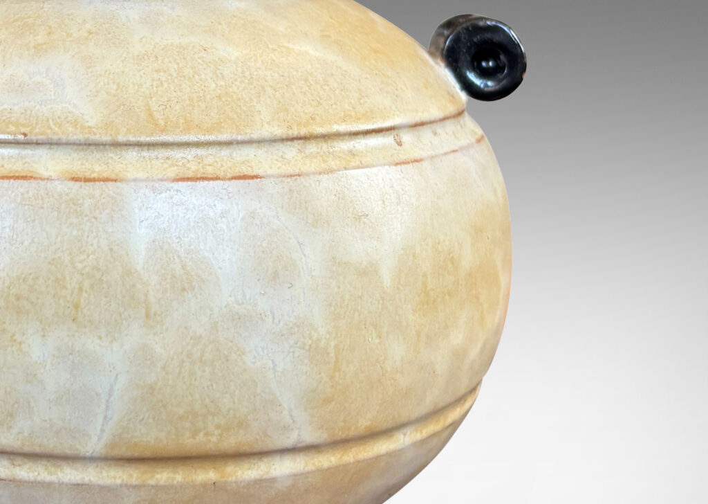 Gallery BAC very plump globe form with articulated mouth, carved bands and scroll handles, glazed in an ethereal butter yellow with black