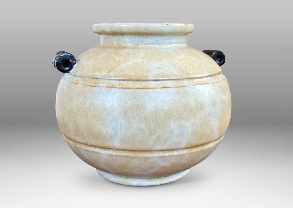 Gallery BAC very plump globe form with articulated mouth, carved bands and scroll handles, glazed in an ethereal butter yellow with black