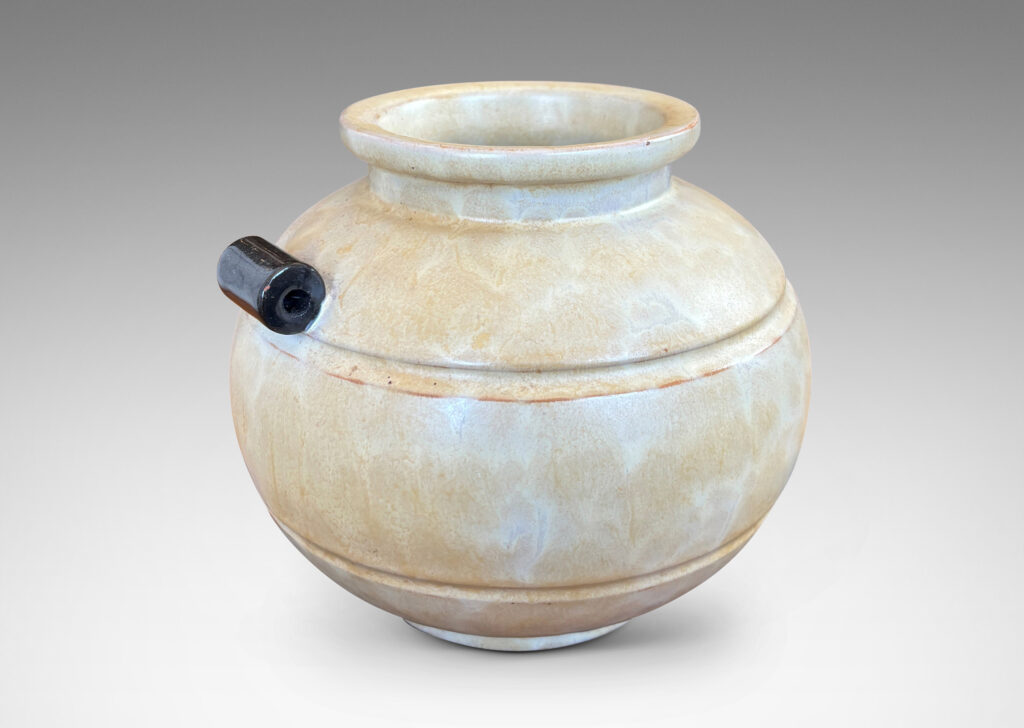 Gallery BAC very plump globe form with articulated mouth, carved bands and scroll handles, glazed in an ethereal butter yellow with black