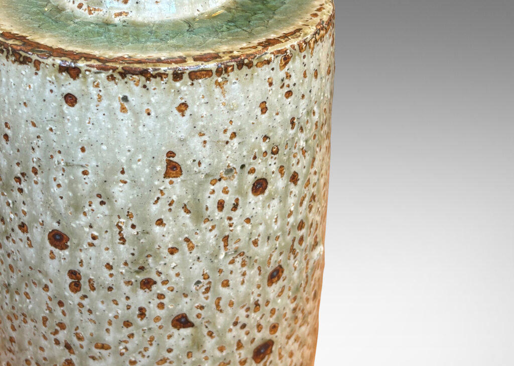 Gallery BAC cylindrical form in pale gray with burnt sienna spots and edges
