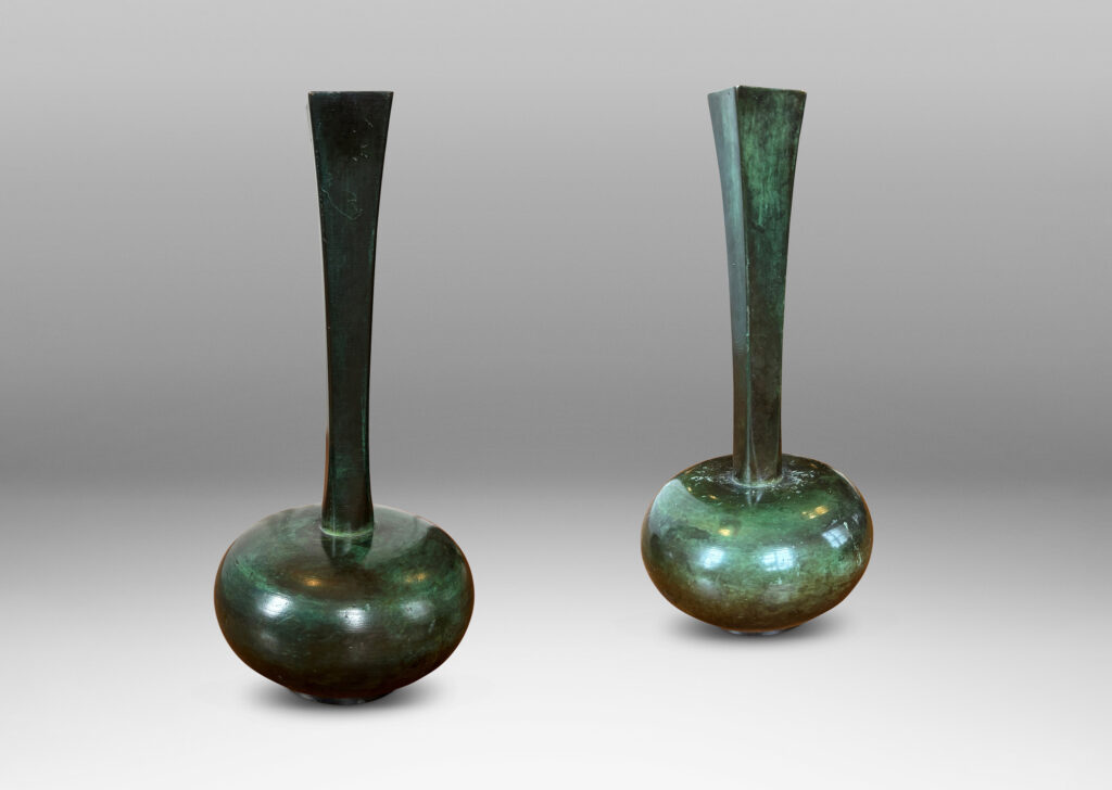 Gallery BAC sinuously modeled form on a square base; polished bronze