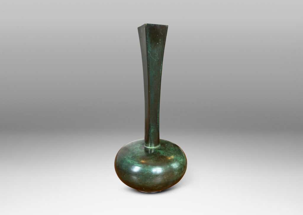 Gallery BAC sinuously modeled form on a square base; polished bronze