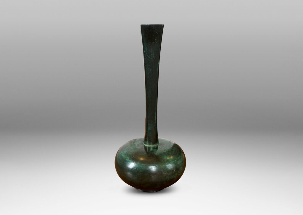 Gallery BAC sinuously modeled form on a square base; polished bronze