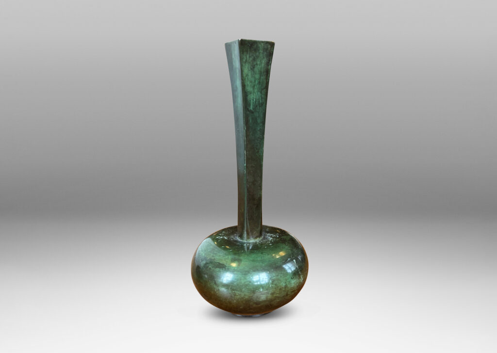Gallery BAC sinuously modeled form on a square base; polished bronze