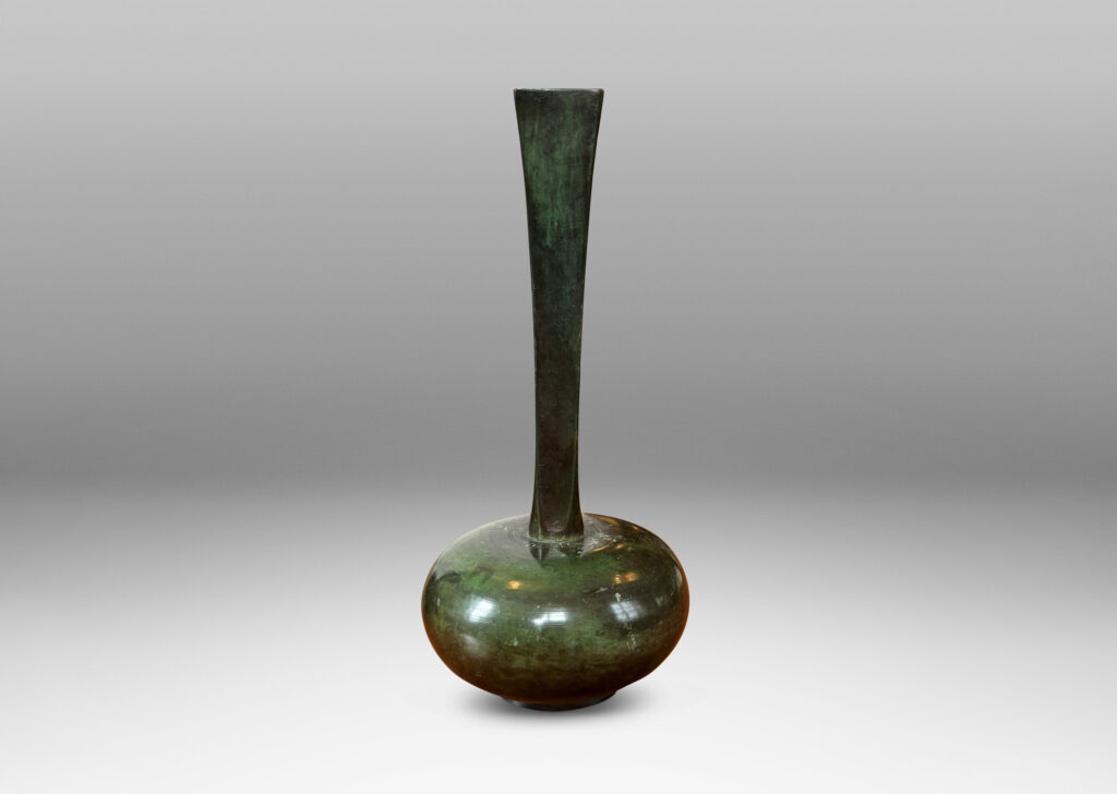 Gallery BAC sinuously modeled form on a square base; polished bronze