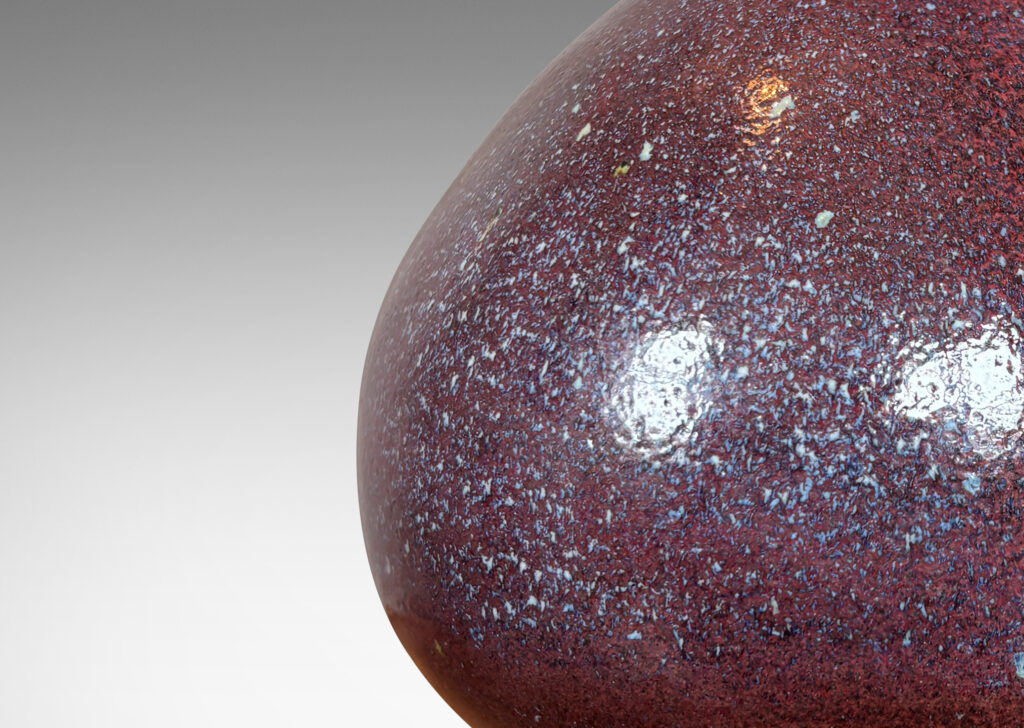 Gallery BAC bulbous form glazed in a rich oxblood burgundy with pale gray accents