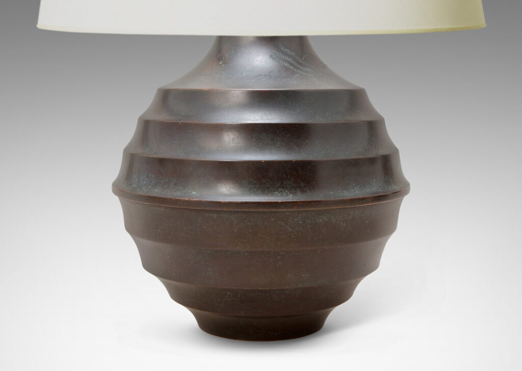 Gallery BAC globe form with horizontal fluting and engraved motif, with handsome original patination