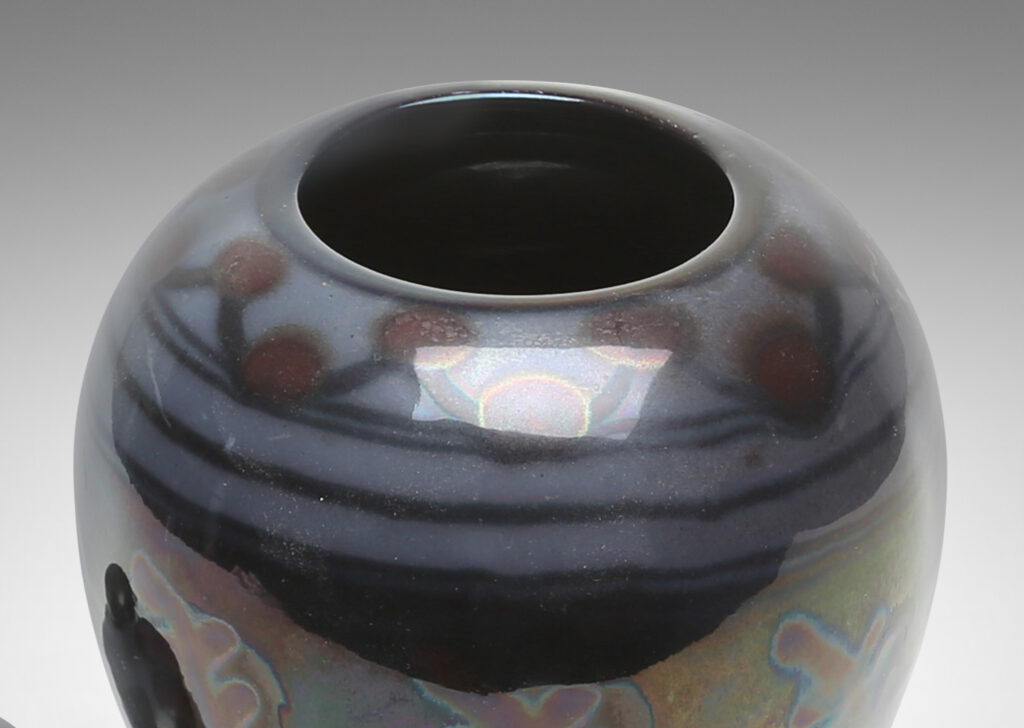 Gallery BAC tapered globe body with dome lid and ball finial, glazed in gray, purple and burgundy luster