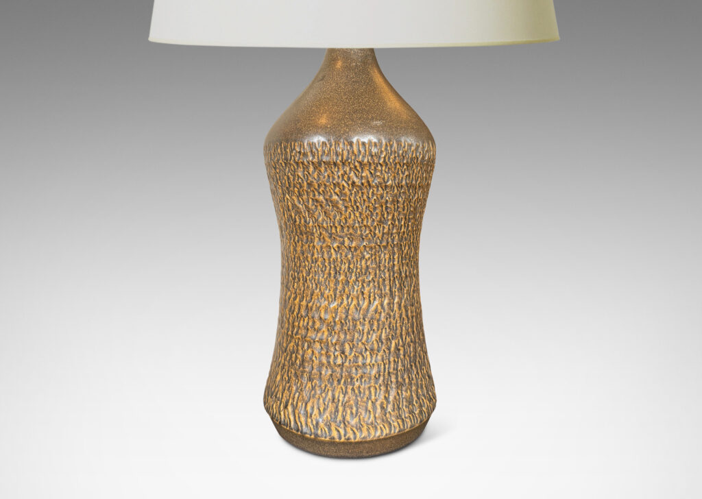 Gallery BAC sinuously modeled profile with carved texture and brown glaze