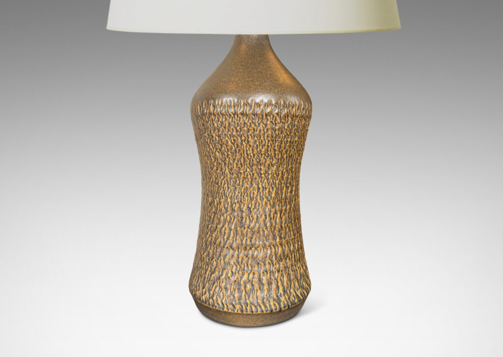 Gallery BAC sinuously modeled profile with carved texture and brown glaze