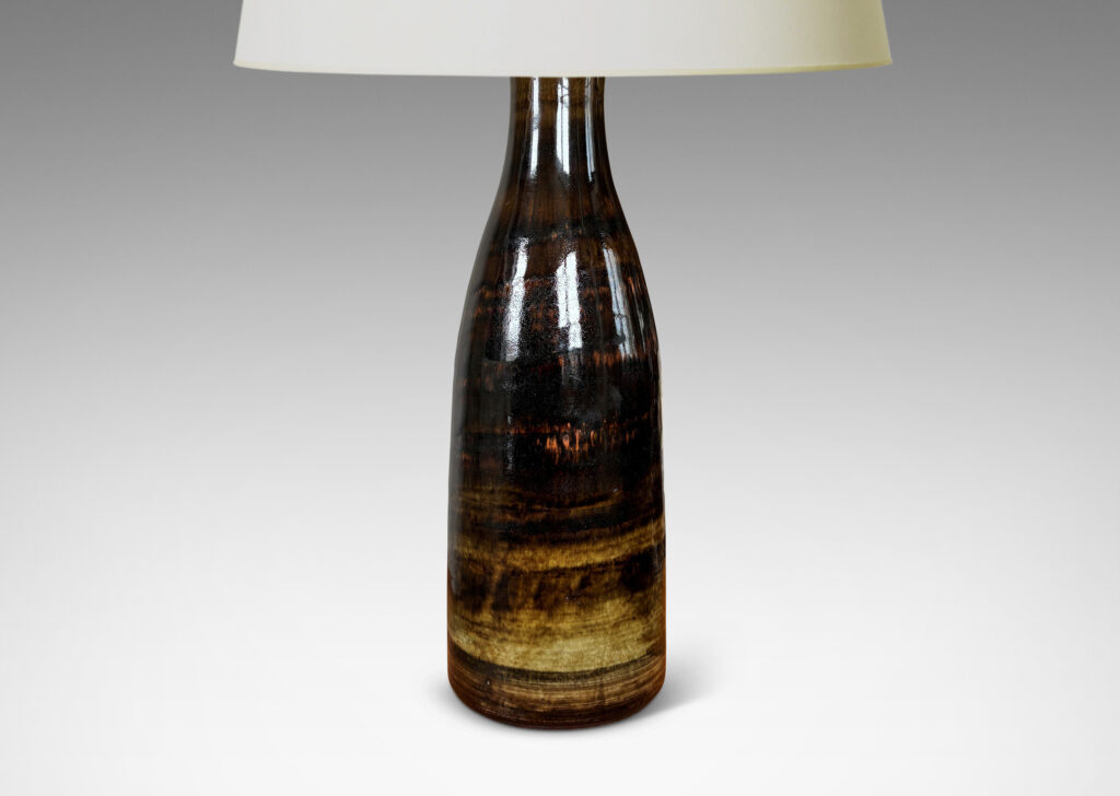 Gallery BAC tall bottle-like form glazed in brown tones with a striae texture