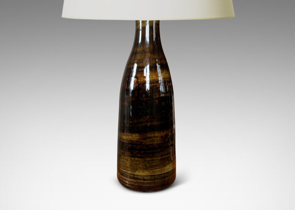 Gallery BAC tall bottle-like form glazed in brown tones with a striae texture