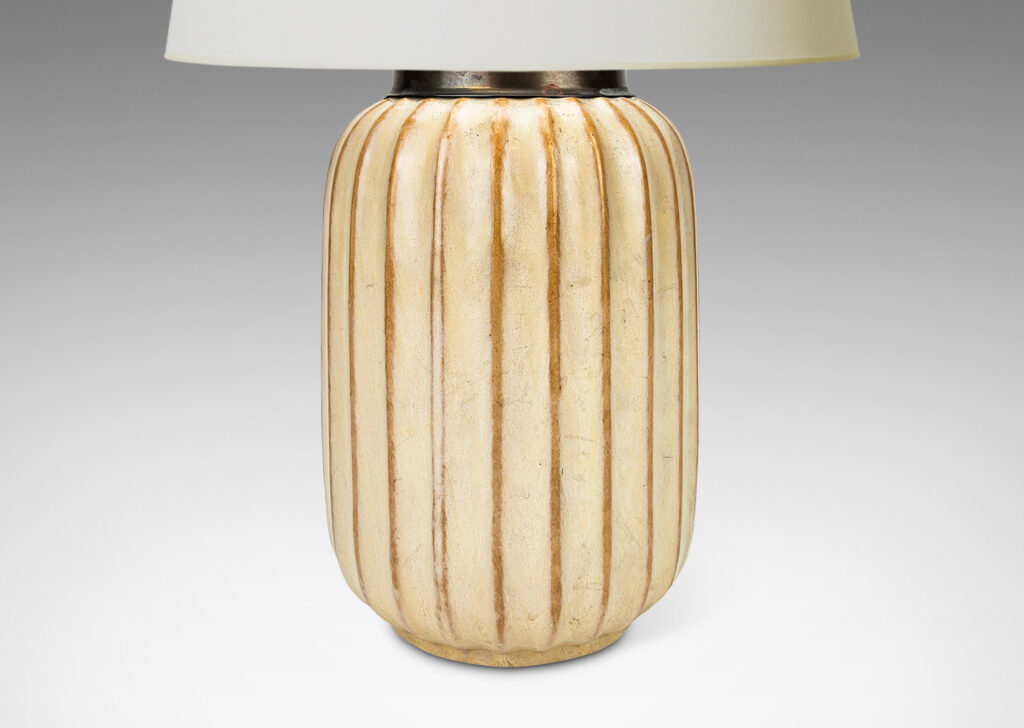 Gallery BAC straight-sided ovoid form with vertical fluting in a sponged pale green-cream glaze