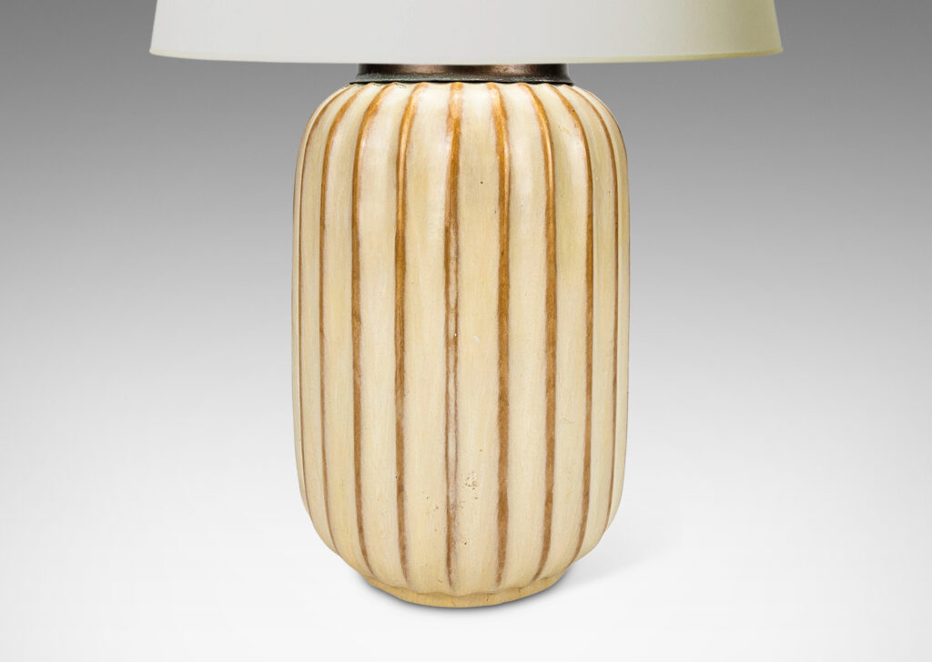 Gallery BAC straight-sided ovoid form with vertical fluting in a sponged pale green-cream glaze