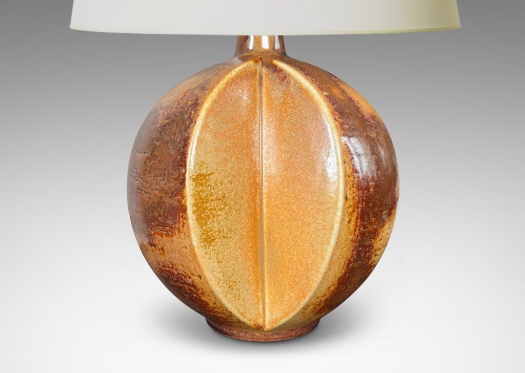 Gallery BAC globe form with wedge slices, glazed in orangey-tan and brown