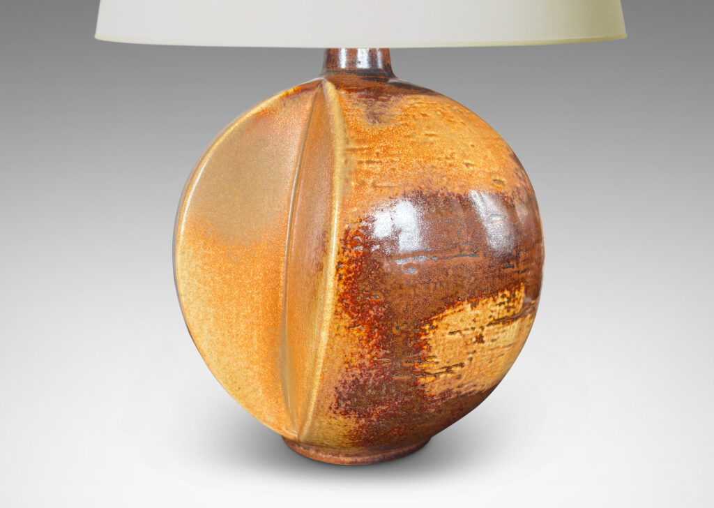 Gallery BAC globe form with wedge slices, glazed in orangey-tan and brown