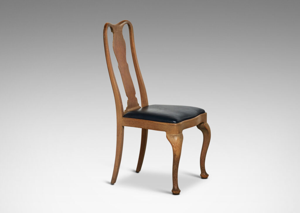 Gallery BAC sinuously modeled backs, sculptural back splats with beveled edges, and cabriole front legs terminating in bun feet