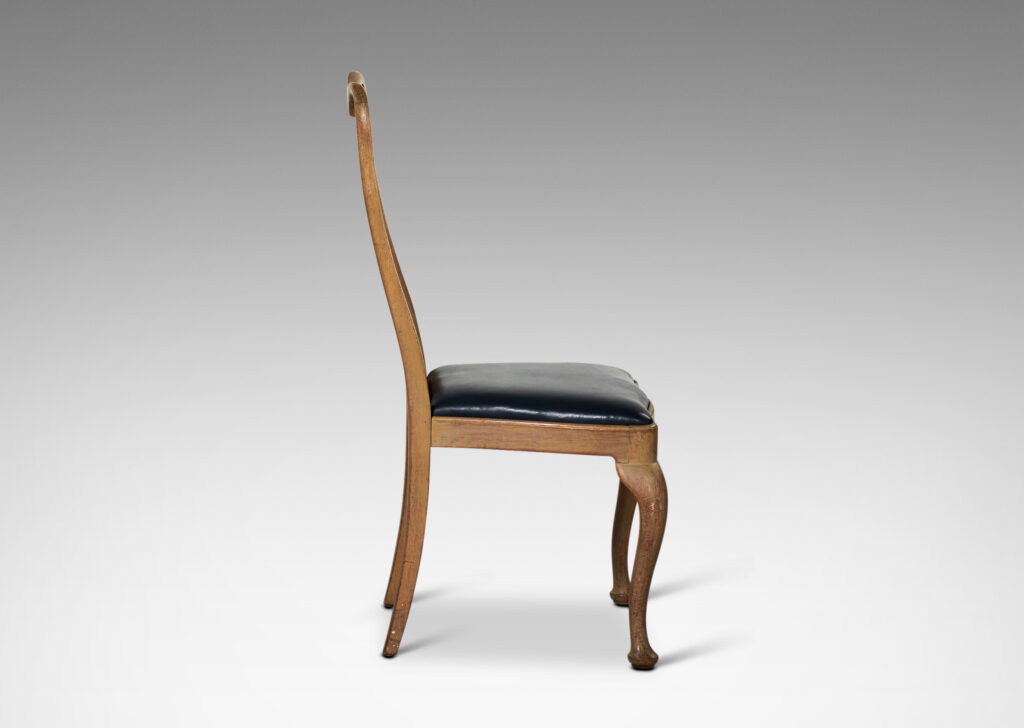 Gallery BAC sinuously modeled backs, sculptural back splats with beveled edges, and cabriole front legs terminating in bun feet