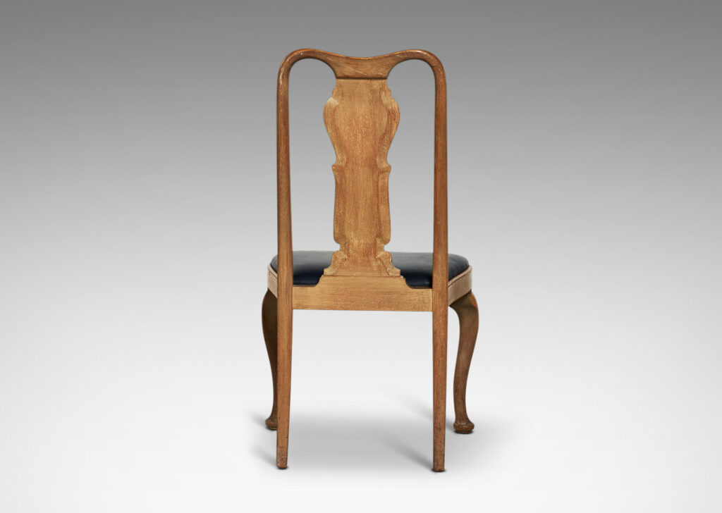 Gallery BAC sinuously modeled backs, sculptural back splats with beveled edges, and cabriole front legs terminating in bun feet