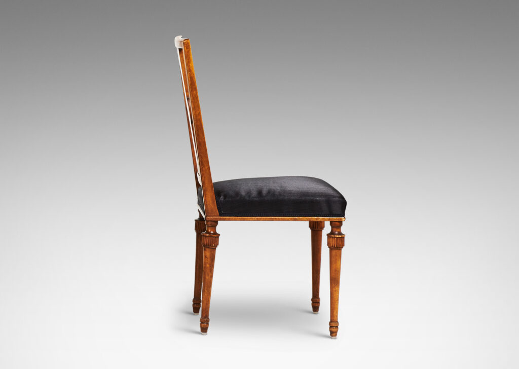 Gallery BAC squared backs with splats ornamented with radiating fluting and central disk medallions, and tapered legs with stylized tassel headers