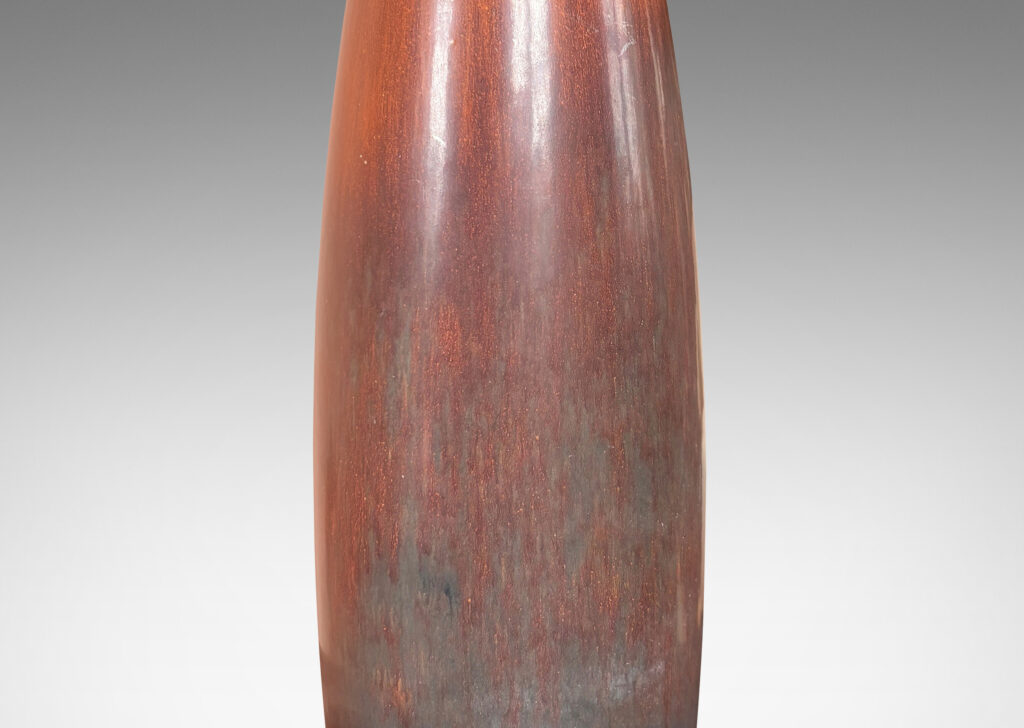 Gallery BAC swelling cylindrical form with flared mouth, glazed in a red-brown and brown harefur