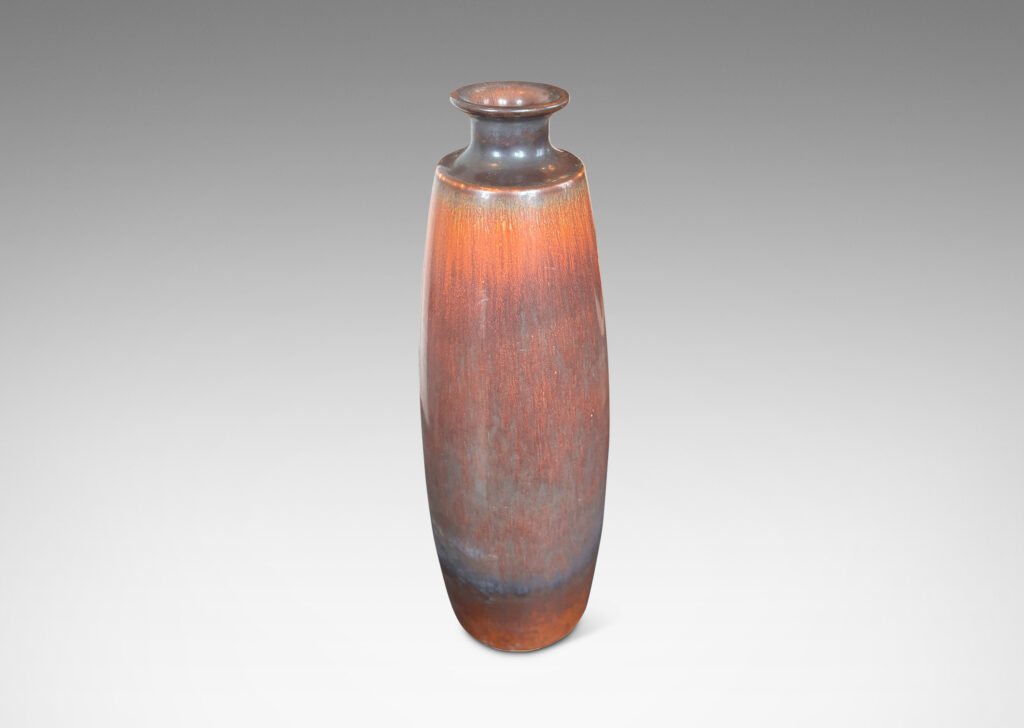 Gallery BAC swelling cylindrical form with flared mouth, glazed in a red-brown and brown harefur