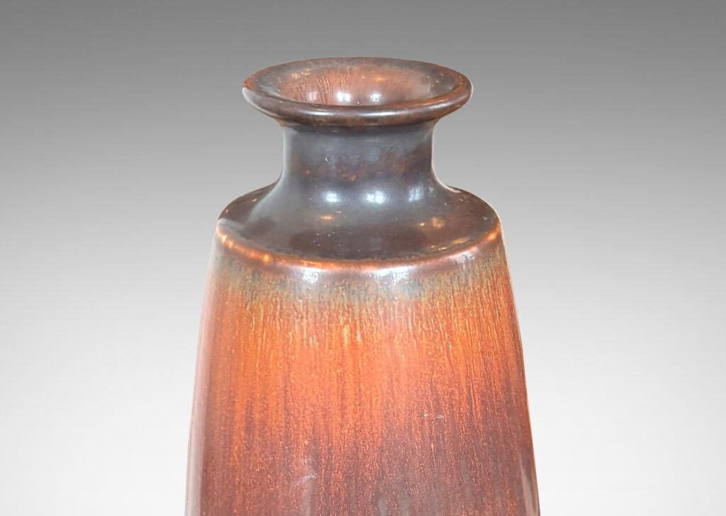 Gallery BAC swelling cylindrical form with flared mouth, glazed in a red-brown and brown harefur