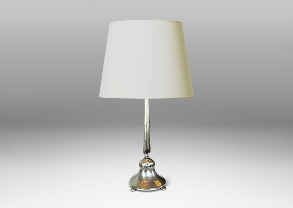 Gallery BAC swelling stand and pillowy flared base with repousse hammered texture, and scrolling acanthus leaf ornamentation