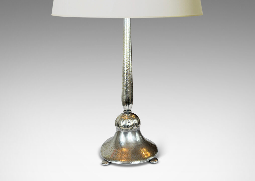 Gallery BAC swelling stand and pillowy flared base with repousse hammered texture, and scrolling acanthus leaf ornamentation