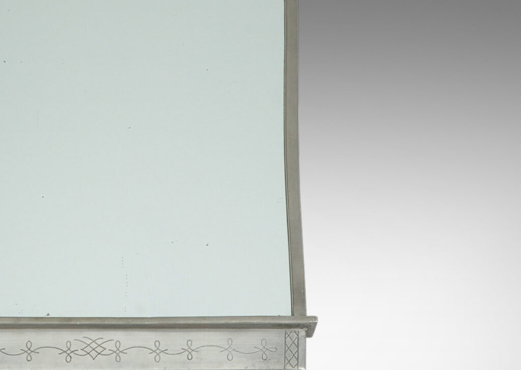 Gallery BAC arched form with shell finial, engraved mantle and foliate brackets; pewter and mirrored glass