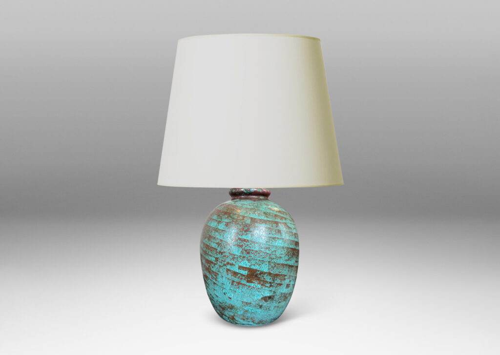 Gallery BAC ovoid form glazed in a marvelous celadon green-red luster with spiraling craquelure